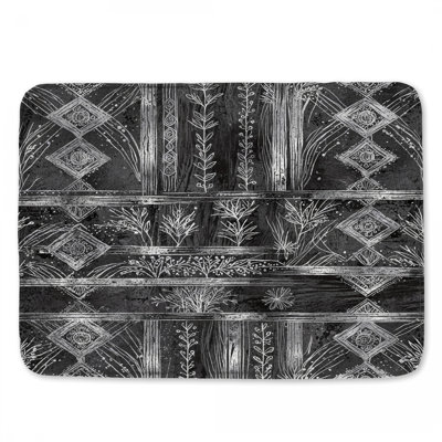 Tapis de bain noir et blanc à motif botanique
