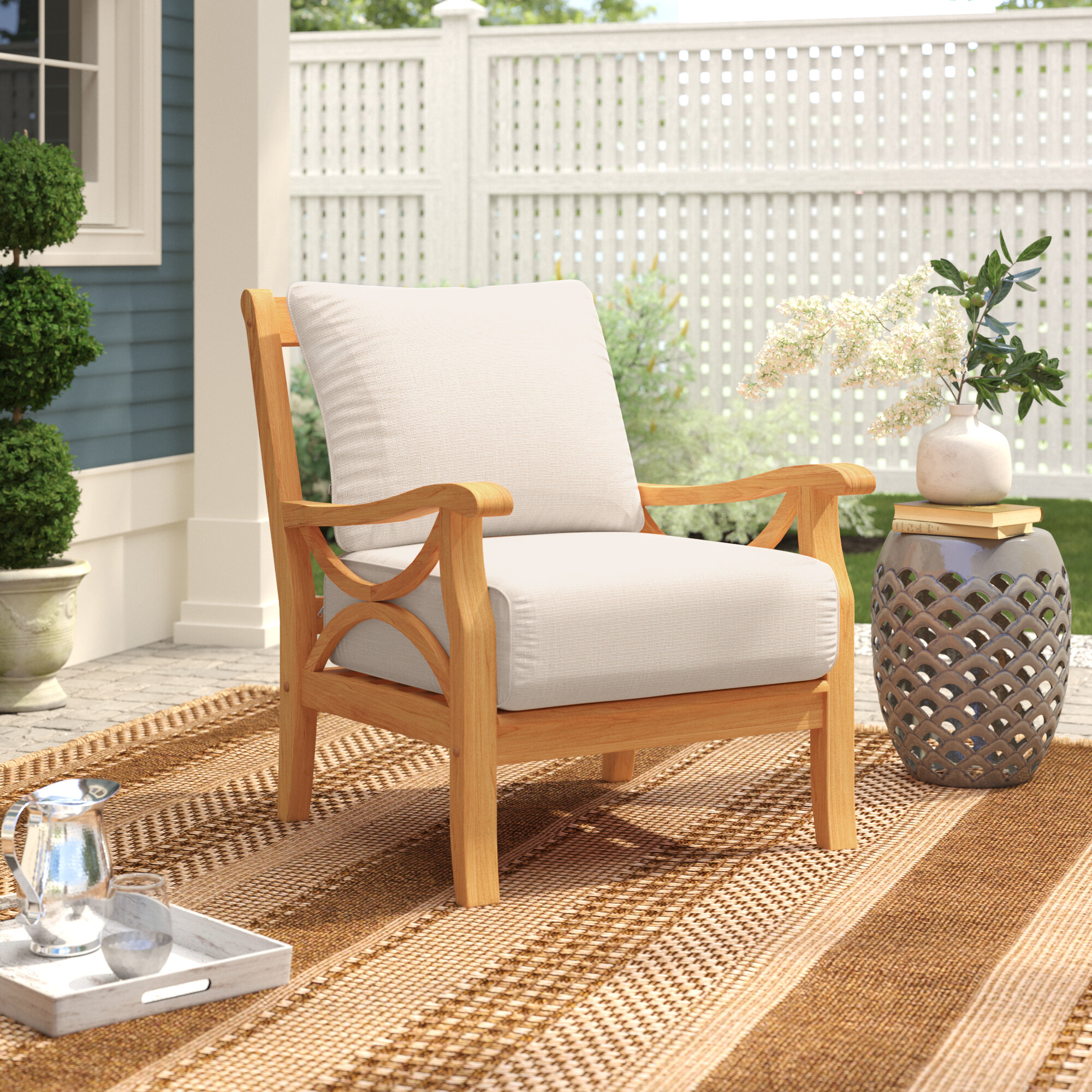 https://assets.wfcdn.com/im/44351690/compr-r85/9314/93144029/brunswick-teak-patio-chair-with-cushions.jpg