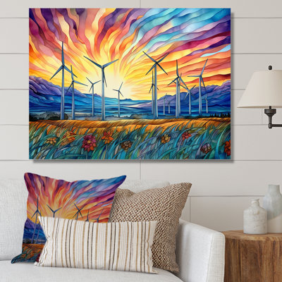 Éoliennes au lever du soleil