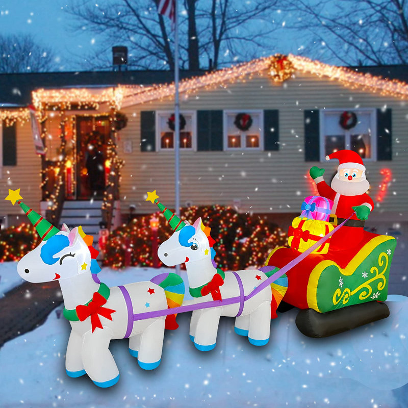 Père Noël gonflable en traîneau