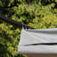 Auvent rétractable Outsunny 11,5 pi x 11,5 pi, structure en acier gris avec protection UV pour patio et jardin