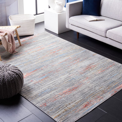 Tapis abstrait gris clair / rouille