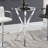 Craig-Luka Round Glass Top Metal Base Dining Table