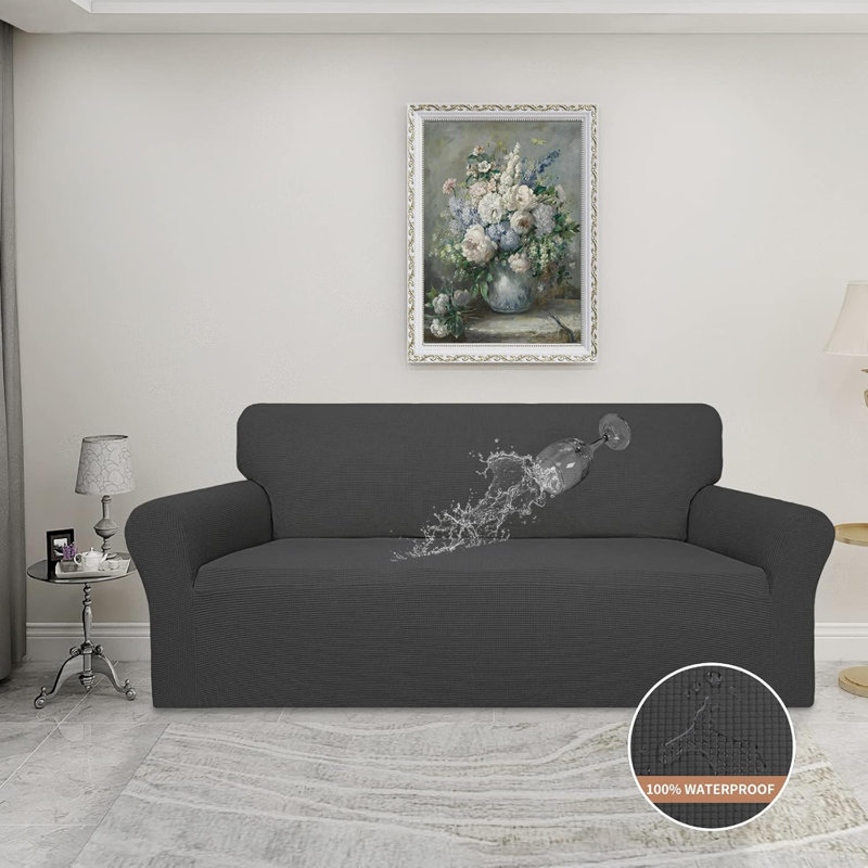 Housse imperméable et extensible pour canapé