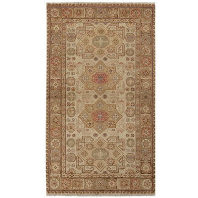 Tapis crème et doré de haute qualité noué à la main