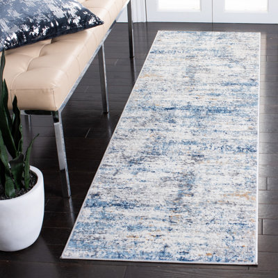 Adalee Abstract Ivory/Blue Area Rug