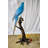 Giant Parrot Standing on a Tree Statue