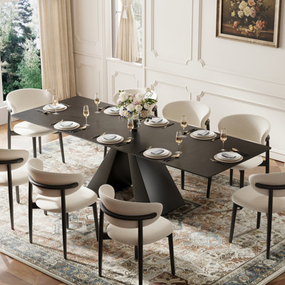 63"–94.5" Modern Extendable Dining Table with Black Sintered Stone Top and Carbon Steel Pedestal Base