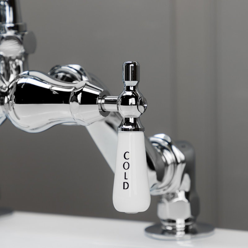 Robinet pour baignoire sur pattes trois poignées avec robinet de déviation et douchette, Chrome