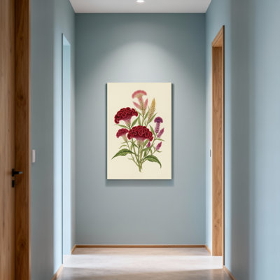 Arrangement floral de plantes et de fleurs avec des fleurs rouges et mauves