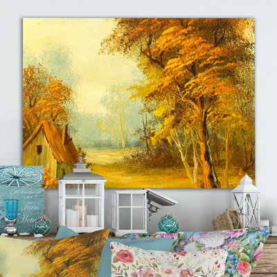 Haut arbre à côté de la petite maison - reproduction sur toile