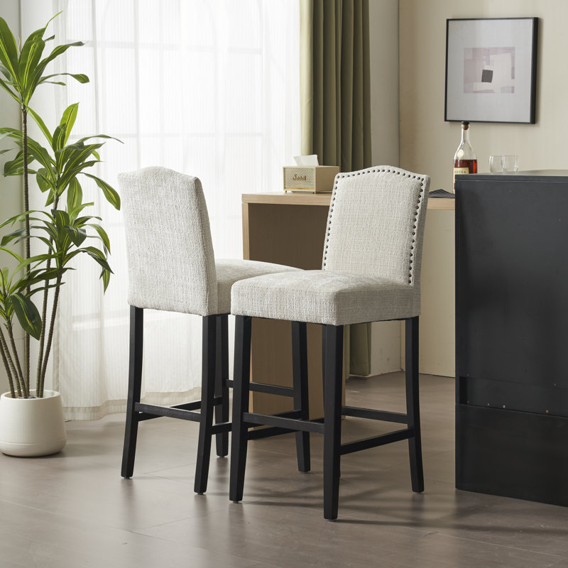 Tabouret de bar rembourré Baltimore avec structure en bois massif