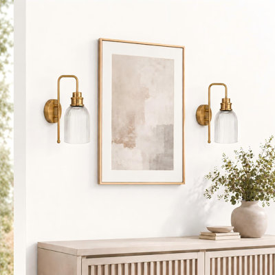 Brushed Gold Wall Sconce with Ribbed Clear Glass shade