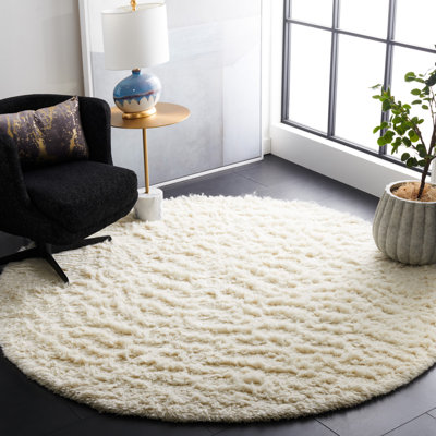 Jedrik Hand Tufted Wool Solid Color Rug