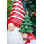 Père Noël tenant un sapin de Noël illuminé à l'intérieur et à piles