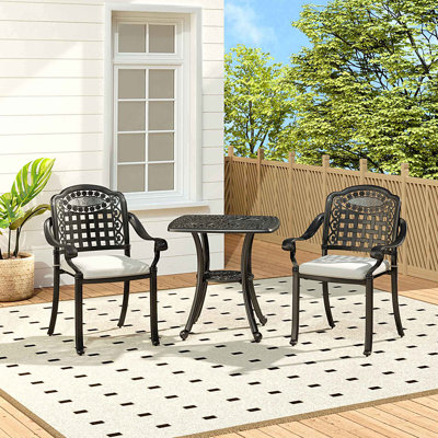 Tobiah 2 - Person Patio Dining Set Umbrella Hole Included Rectangular Table with Cushions Included