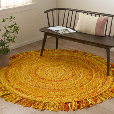 Kelling Solid Color Handwoven Cotton Area Rug in Gold