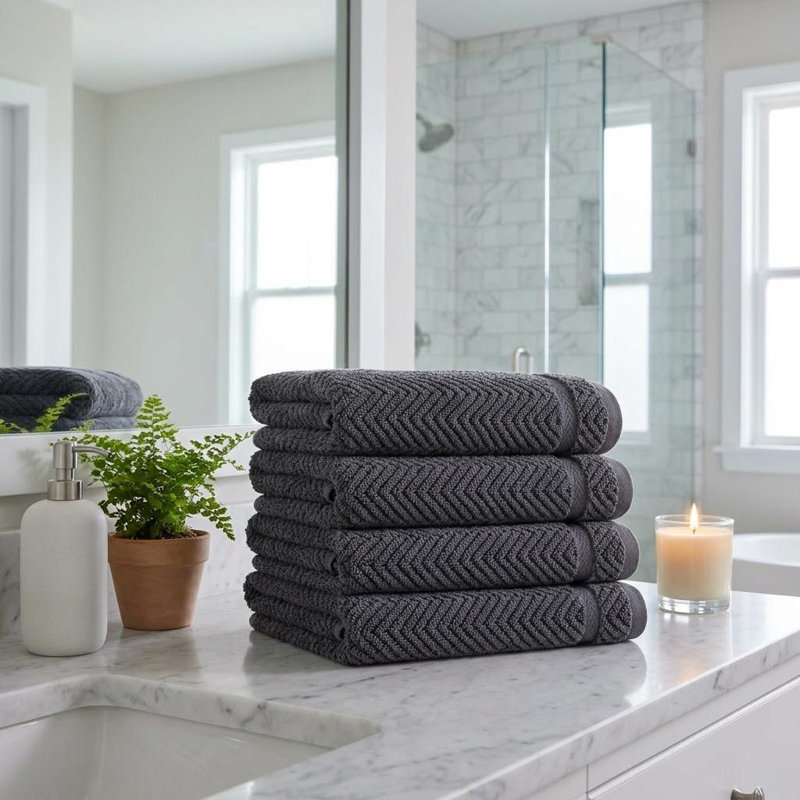 Lot de quatre serviettes de toilette en coton turc à chevrons gris foncé, 40 x 75 cm