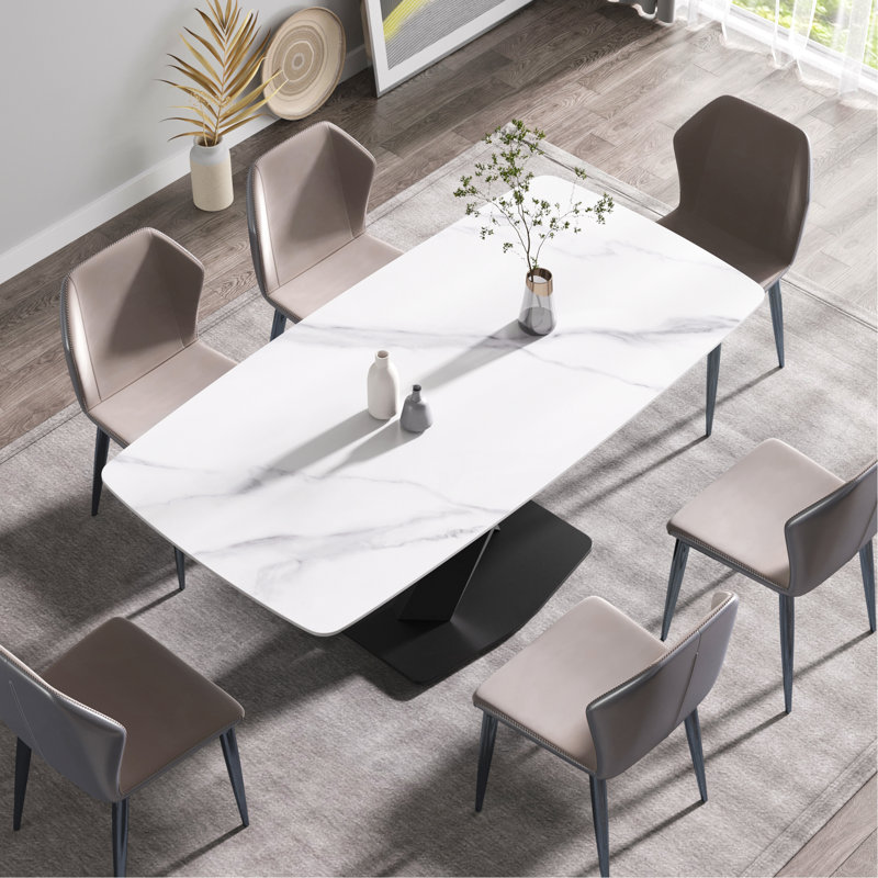 Table de salle à manger 70,87 "en pierre artificielle moderne avec pieds courbés en métal noir et blanc pouvant accueillir 6 à 8 personnes