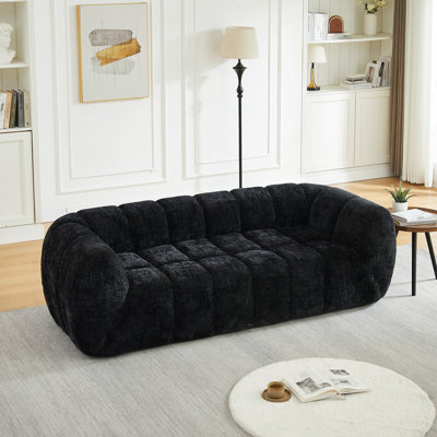 Canapé en chenille avec coussin moelleux