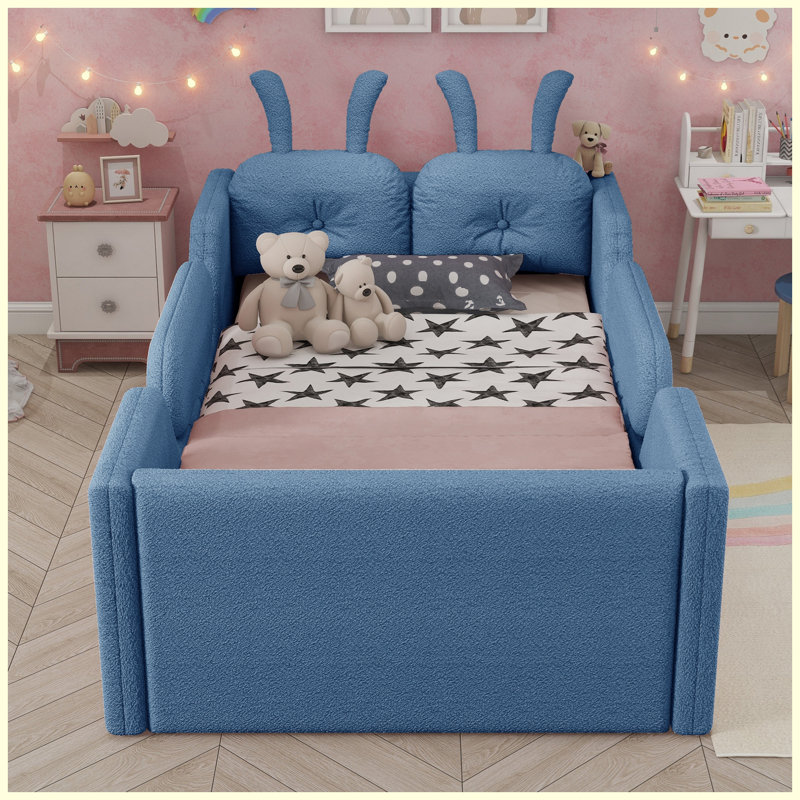 Lit plateforme simple tapissier bleu pour enfants avec coussin en lapin et rails latéraux amovibles