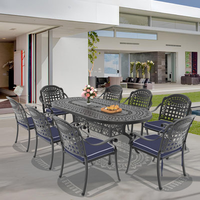 81.89"L 41.34"W Oval Table Cast Aluminum Outdoor Dining Set with Umbrella Hole and Blue Cushions