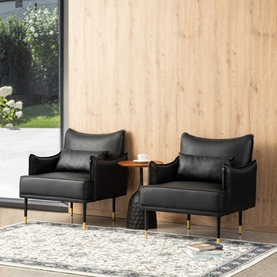 Mid-Century Modern Black Leatherette Armchair With Gold Trimmed Metal Legs And Side Pocket