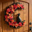Décoration de porte d'Halloween en forme de couronne florale orange rouge rose