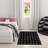 Tapis noir Arranjeet-107264577