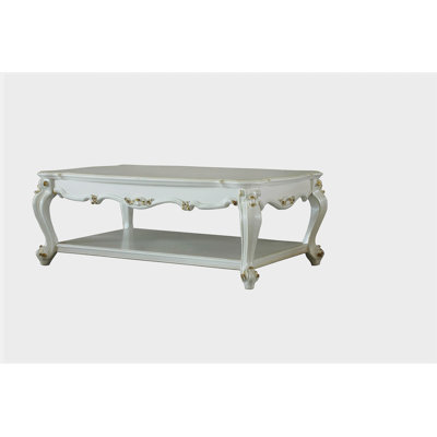 Table basse rétro avec base perlée