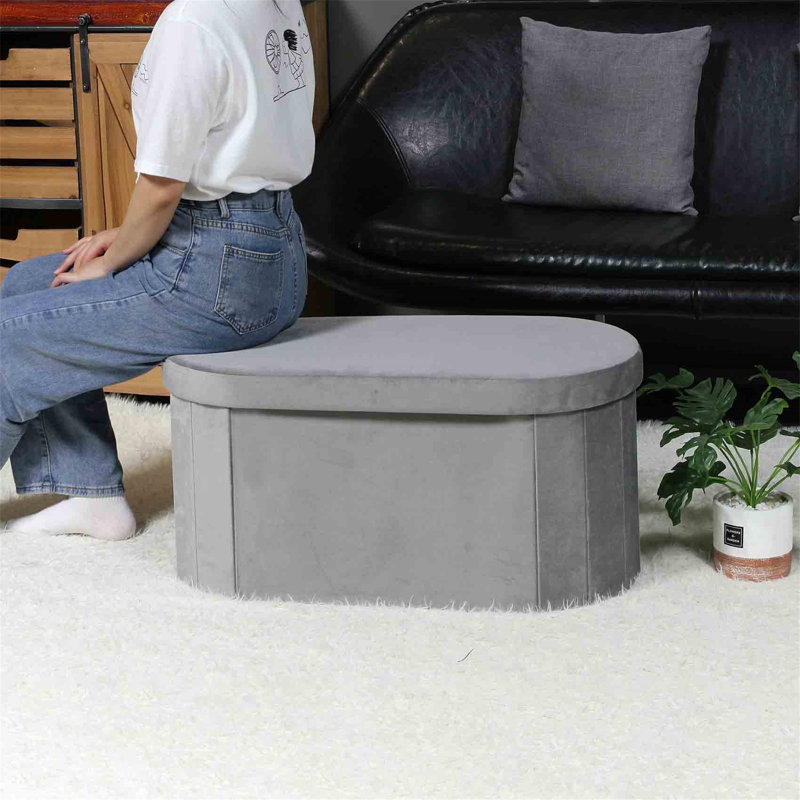 Voegele 76cm Wide Oval Solid Colour Ottoman with Storage, Grey