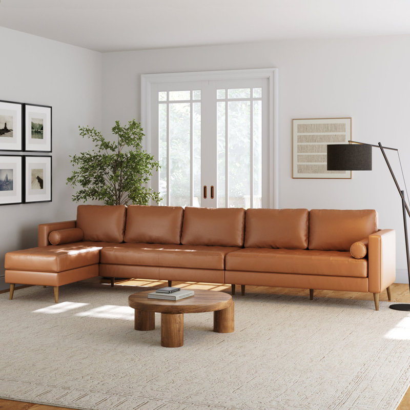 Canapé en cuir brun clair avec coussin de banc capitonné et structure en bois massif