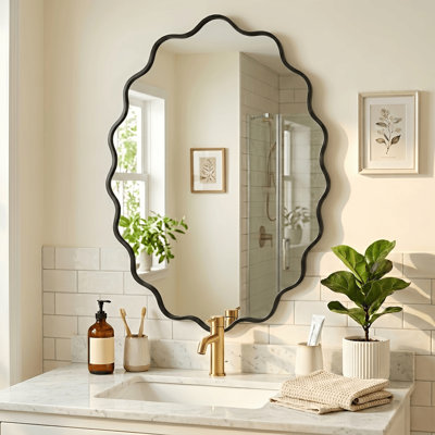 Miroir mural ovale en métal