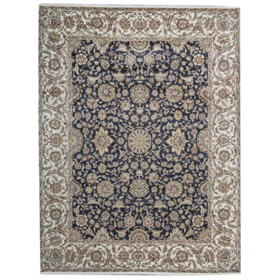 Tapis noir et crème noué à la main de haute qualité