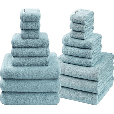 Ensemble de 18 serviettes de bain en coton avec boucles de suspension, bleu. Parfait pour les salles de bain familiales, les salles de bain pour invités, les maisons avec plusieurs salles de bain et pour une rotation régulière. Certifié OEKO-TEX, facile d'entretien.