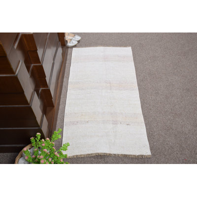 Handwoven Turkish Wool Rug in Subtle Beige with Pastel Stripes Ideal for Rustic Home Decor
