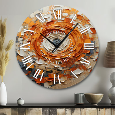 Horloge murale orange et blanche