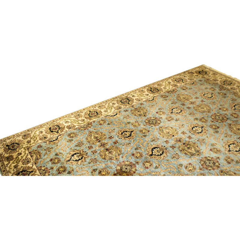 Tapis bleu et ivoire de haute qualité noué à la main