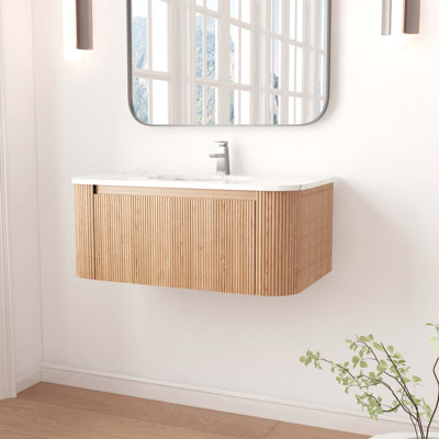 Meuble-lavabo mural 36 po avec comptoir en marbre artificiel Cararra, lavabo en céramique, conception courbée avec rayures, pré-assemblé