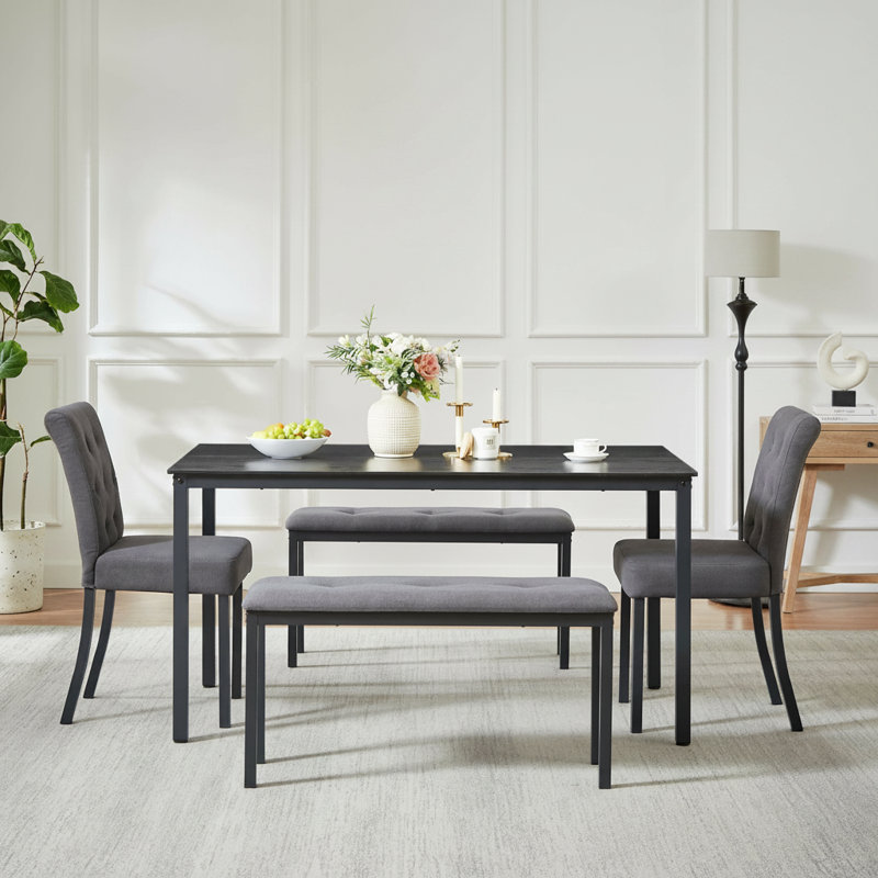Cet ensemble de salle à manger rustique 5 pièces est offert en gris-noir et comprend une table, deux chaises rembourrées et deux bancs. Doté d'une conception peu encombrante, il est un ajout idéal à votre cuisine et à votre salle à manger.