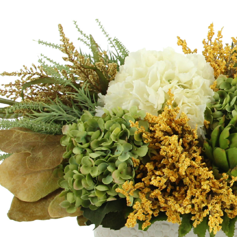 Assorted Hydrangea, Heather And Artichoke Centerpiece In Oval Cream Pot