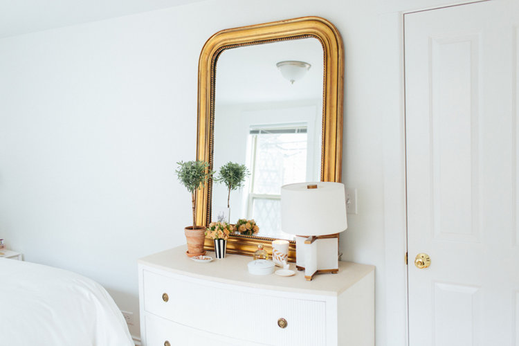 The Everygirl gold accent mirror
