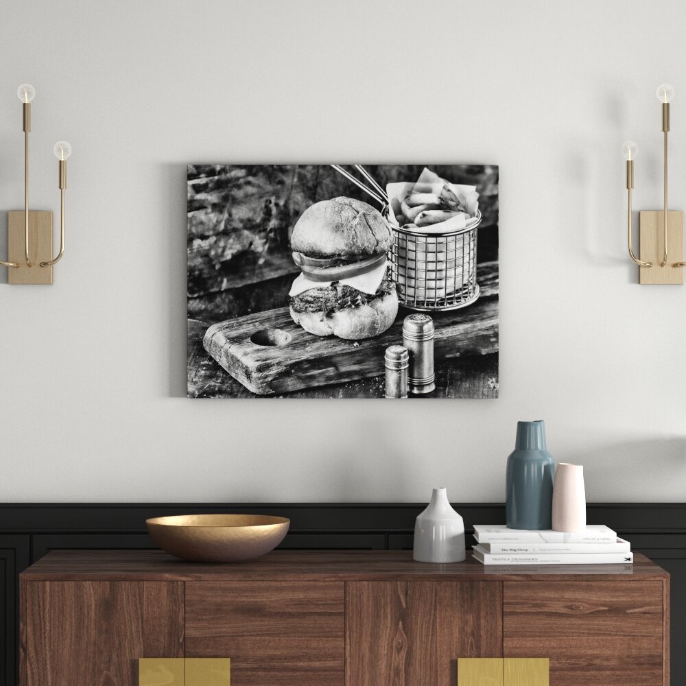 Leinwandbild Cheeseburger mit Pommes in Monochrom