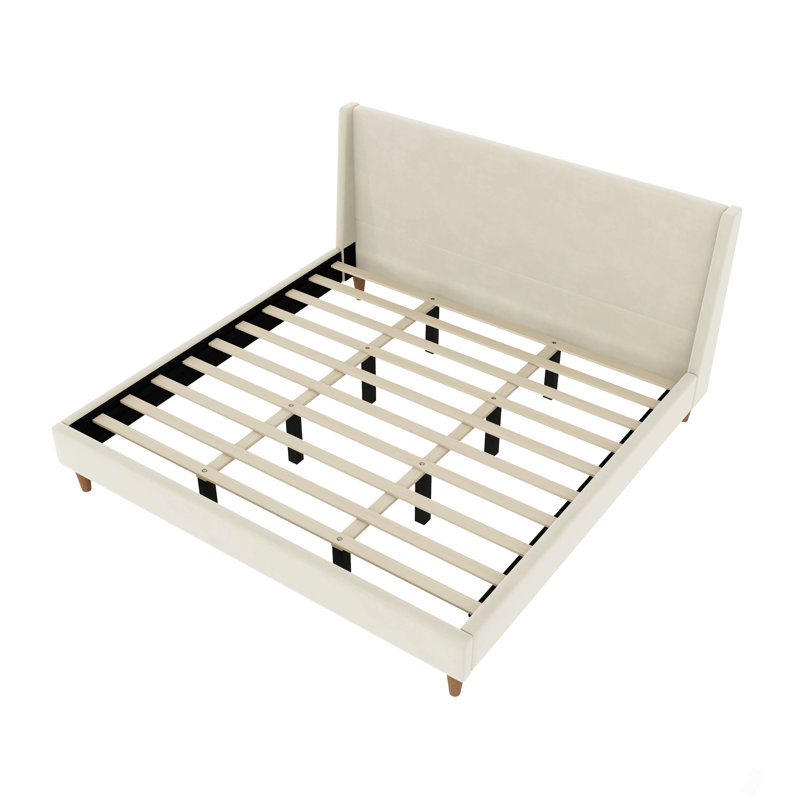 Lit plateforme tapissier moderne en velours beige avec tête de lit à oreilles et pieds en bois de noyer, sans sommier tapissier, très grand