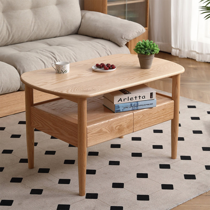 Modern simple oval solid wood coffee table, 23.6" H x 39.4" L x 23.6" D