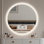 Miroir de salle de bain rond à DEL avec haut-parleur Bluetooth, miroir trempé, intensité variable, antibuée, commande tactile