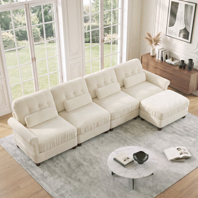 Canapé modulable 4 places avec un pouf et des coussins de soutien lombaire