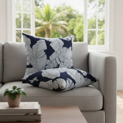 Lot de 4 coussins décoratifs d'intérieur/extérieur avec garniture et fermeture éclair, 45 x 45 cm, imperméables et résistants à la décoloration, pour canapé, fauteuil ou lit – Motif de feuilles tropicales bleues et blanches