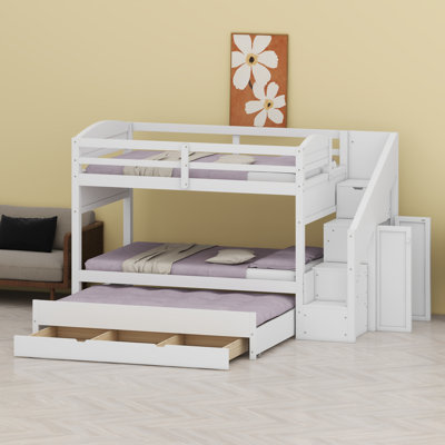 Lit superposé avec lit gigogne, tiroirs de rangement, escalier et garde-robe