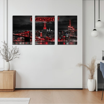 Ensemble de 3 tableaux sur toile représentant un paysage urbain rouge et noir à minuit